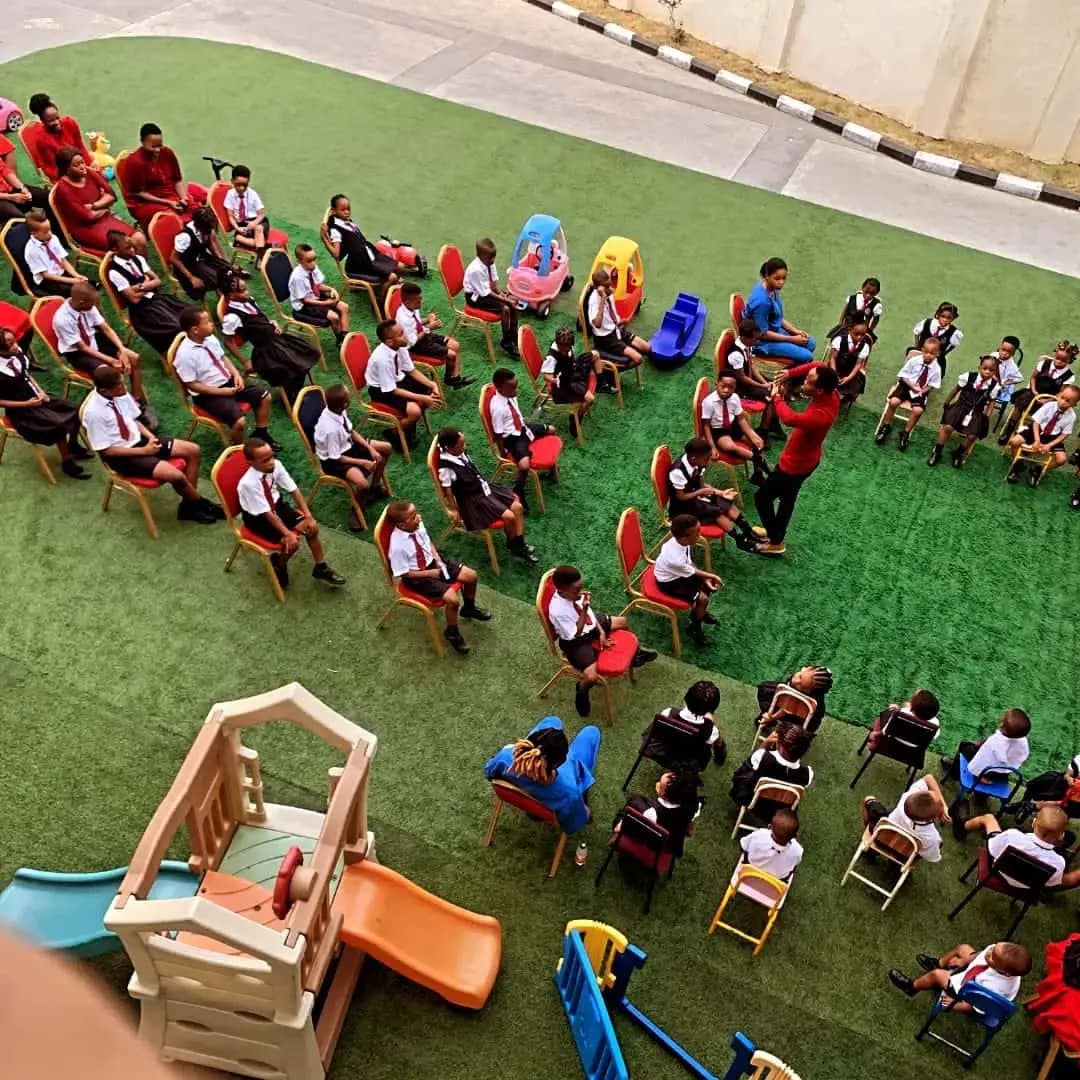 Overhead view of savcord students learning with a teacher